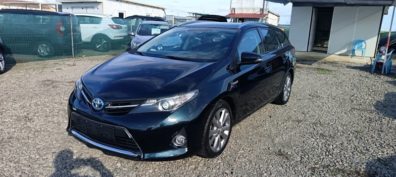 Toyota Auris 1.8 Hybrid * Италия , снимка 7 - Автомобили и джипове - 52626986