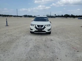 ������ Nissan Rogue