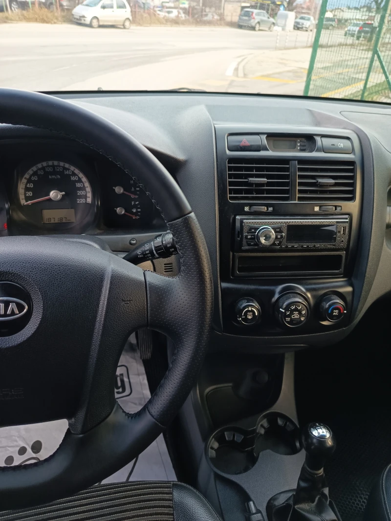Kia Sportage 2.0/141k.c/4x4/, снимка 4 - Автомобили и джипове - 53301385