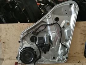 Стъклоповдигач заден ляв Volkswagen Passat 1997-2001 , снимка 1