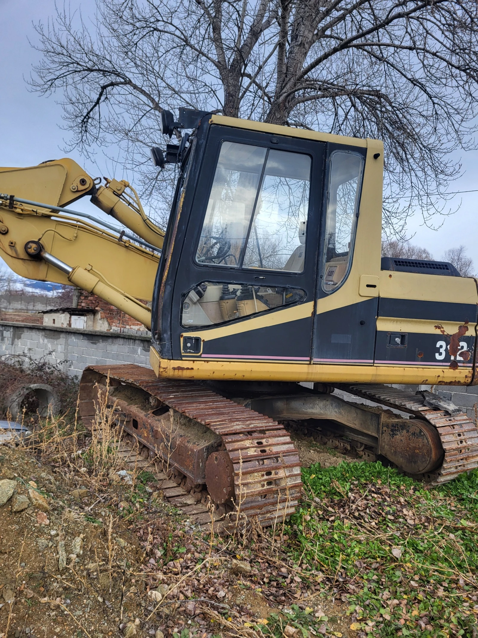 Багер Cat 312