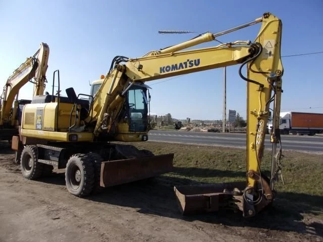 Багер Komatsu PW130-7K