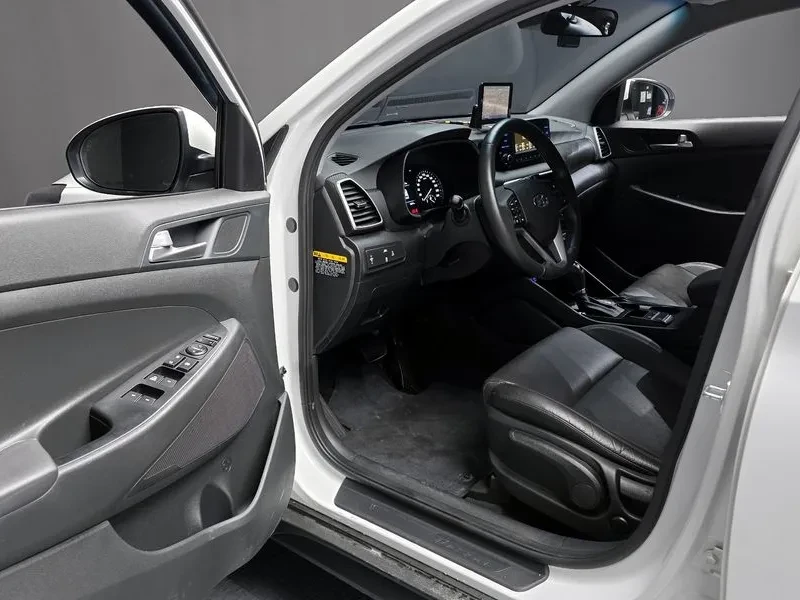 Hyundai Tucson 2.0 4Wd Smart, снимка 11 - Автомобили и джипове - 53365834