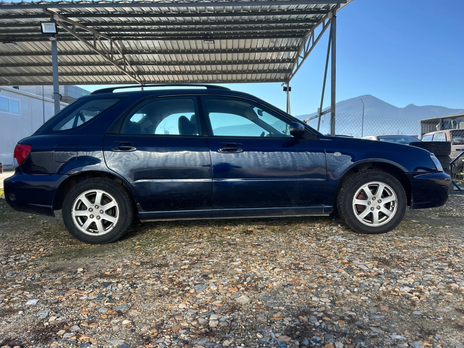 Subaru Impreza 1.6i 95к.с. 4х4 климатик бензин/газ - изображение 4