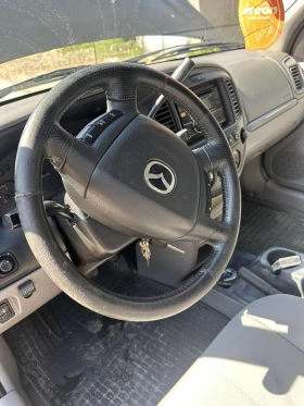 Mazda Tribute 3.0 V6   4x4 автомат - 3999 € / 7821.36 лв. - 44300548 11