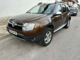 Dacia Duster 1.5dCI, ОБСЛУЖЕНА 1ви собственик , всичко платено, снимка 1