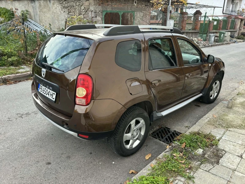 Dacia Duster 1.5dCI, ОБСЛУЖЕНА 1ви собственик , всичко платено, снимка 6 - Автомобили и джипове - 53379747