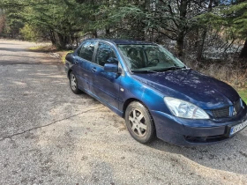 Mitsubishi Lancer - 2990 € / 5847.93 лв. - 86539112 3
