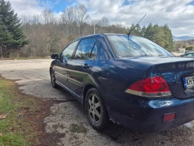 Mitsubishi Lancer - 2990 € / 5847.93 лв. - 86539112 7