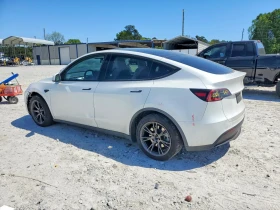 Tesla Model Y - 18400 € / 35987.27 лв. - 86742505 2