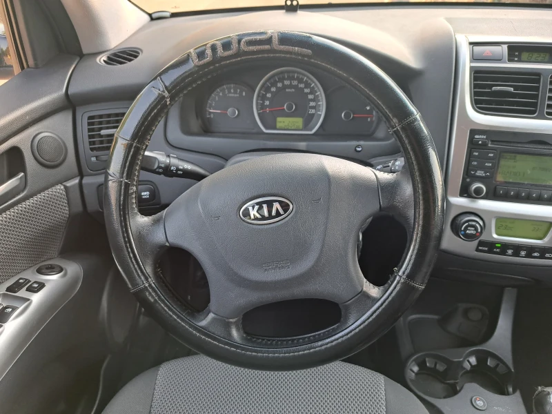Kia Sportage 2.0i* ГАЗ-BRC, снимка 8 - Автомобили и джипове - 51663225