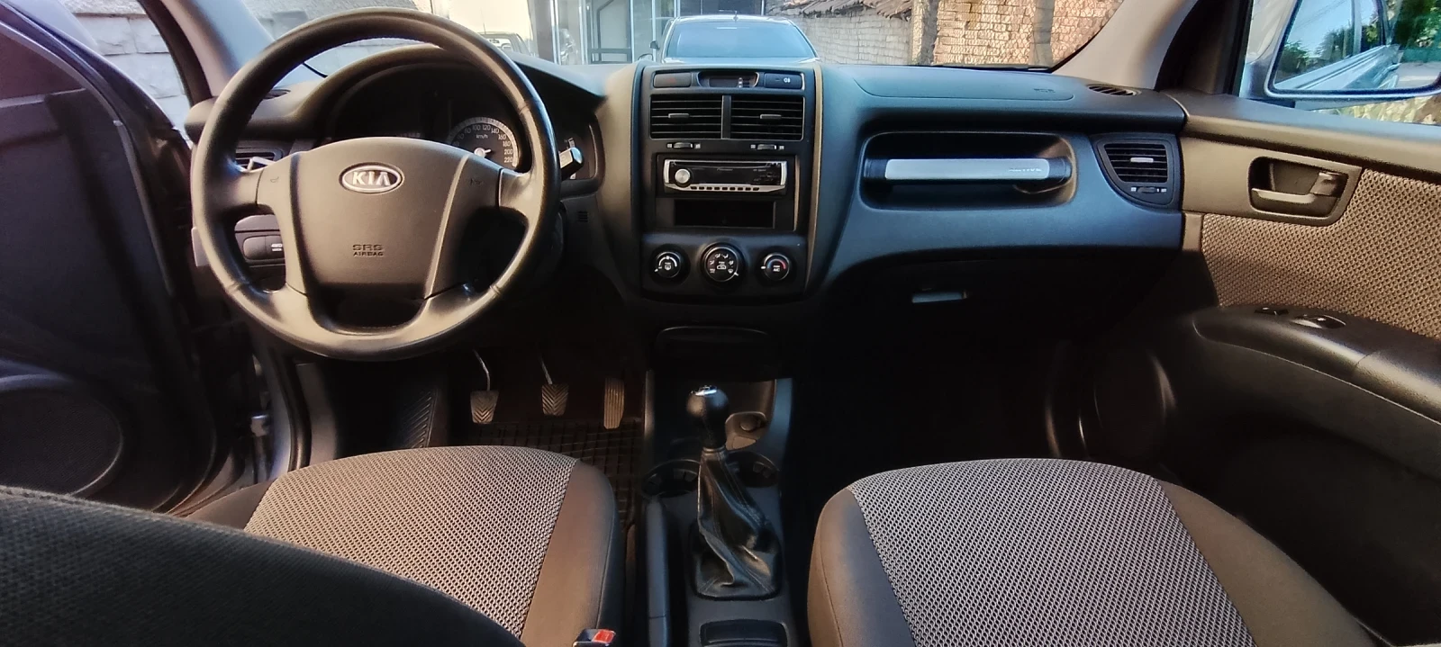 Kia Sportage, снимка 12 - Автомобили и джипове - 54824458