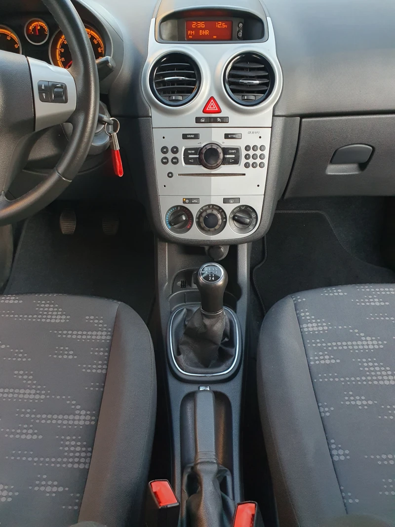 Opel Corsa 1.2i - 4ЦИЛИНДЪРА, снимка 15 - Автомобили и джипове - 52124799