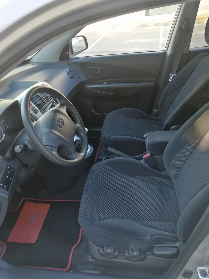 Hyundai Tucson 2.0 CRDi, снимка 9 - Автомобили и джипове - 51337551