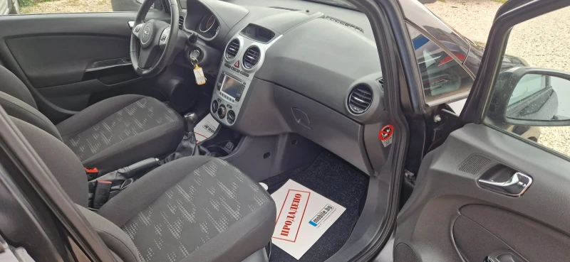 Opel Corsa 1.3 CDTI-NAVI-FACELIFT EURO 5B, снимка 10 - Автомобили и джипове - 49672048