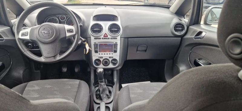 Opel Corsa 1.3 CDTI-NAVI-FACELIFT EURO 5B, снимка 7 - Автомобили и джипове - 49672048