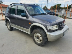     Kia Sportage 2.0i * * * 