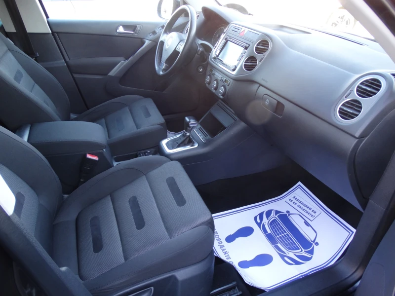 VW Tiguan 2.0TDI * * 4X4* * ПЪЛНА СЕРВИЗНА ИСТОРИЯ!!!, снимка 11 - Автомобили и джипове - 52736649
