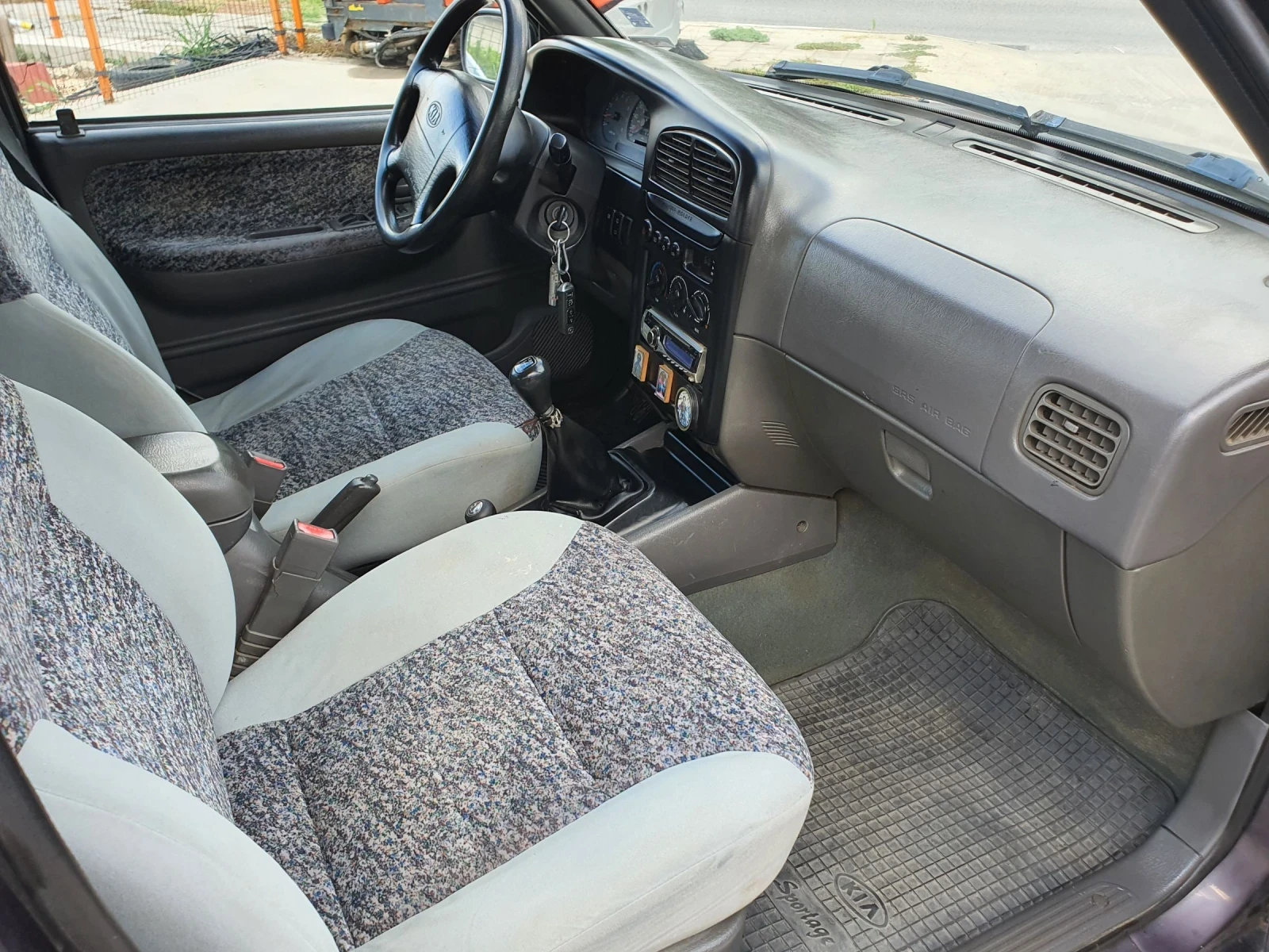 Kia Sportage 2.0i ГАЗ* Повдигнат* ТОП*  - изображение 9