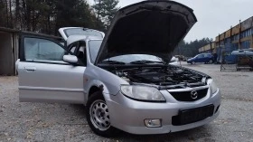 Mazda 323 F, снимка 1