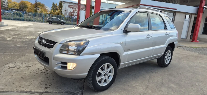 Kia Sportage 2.0i 141К.С* 4Х4* ПЕРФЕКТНА, снимка 11 - Автомобили и джипове - 47792003