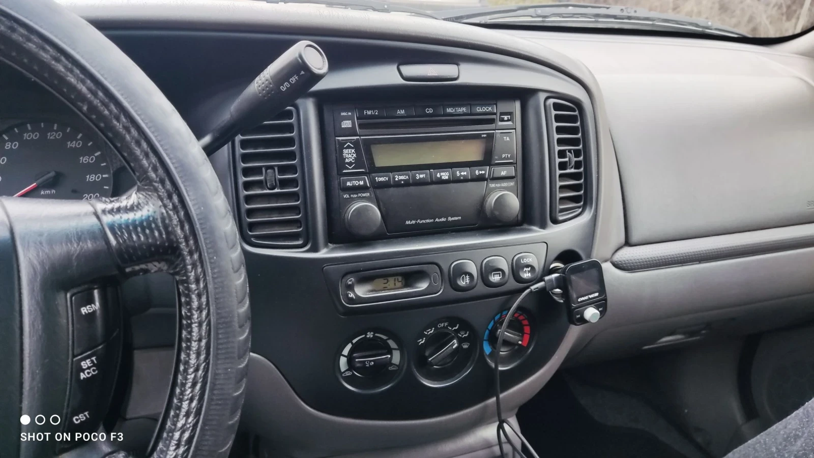 Mazda Tribute 3.0, V6, 4x4 - изображение 7