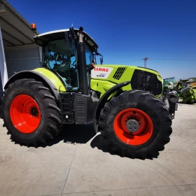      Claas Axion 870   20 %   