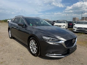 ������ Mazda 6