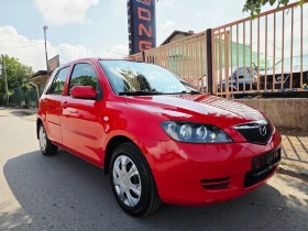 ������ Mazda 2