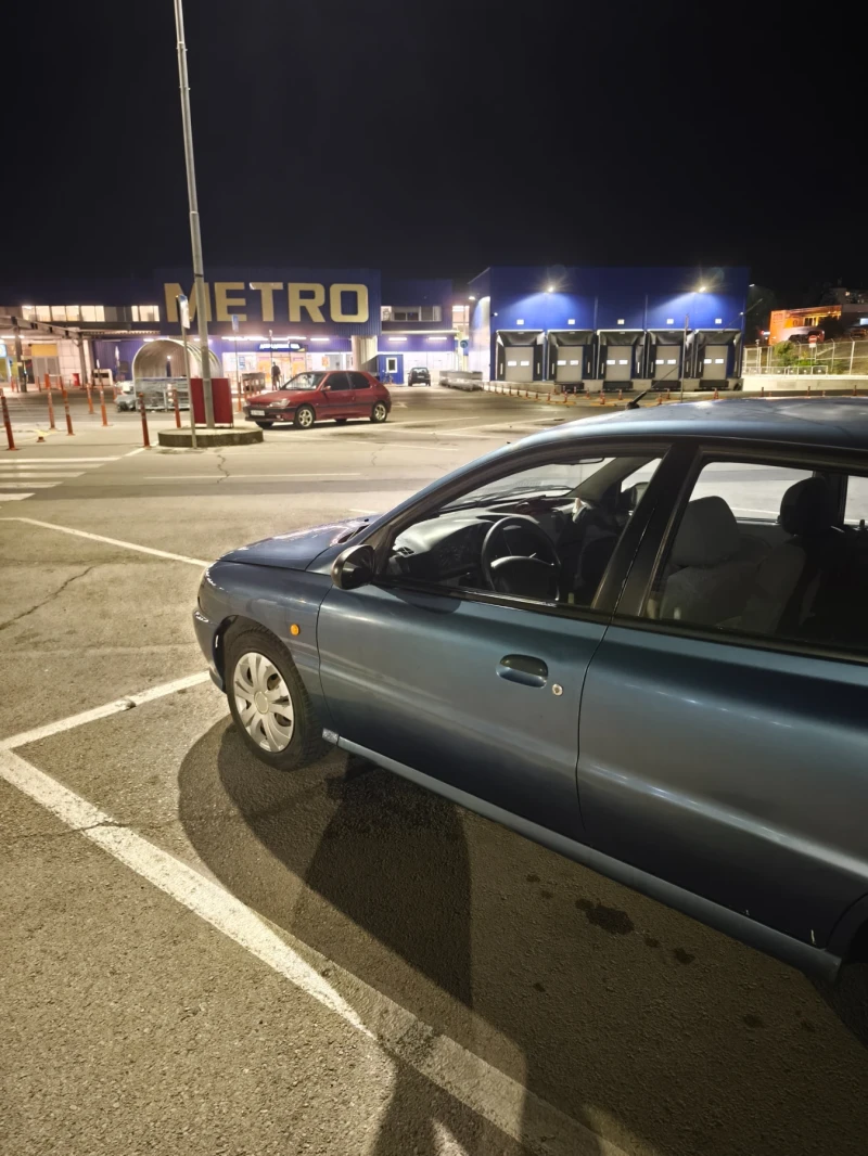 Kia Rio 1.3, снимка 8 - Автомобили и джипове - 52161338