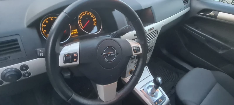 Opel Astra, снимка 10 - Автомобили и джипове - 47654637