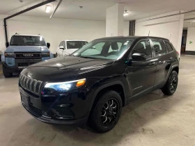������ Jeep Cherokee