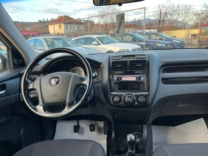 Kia Sportage 2.0i, снимка 9 - Автомобили и джипове - 48910657