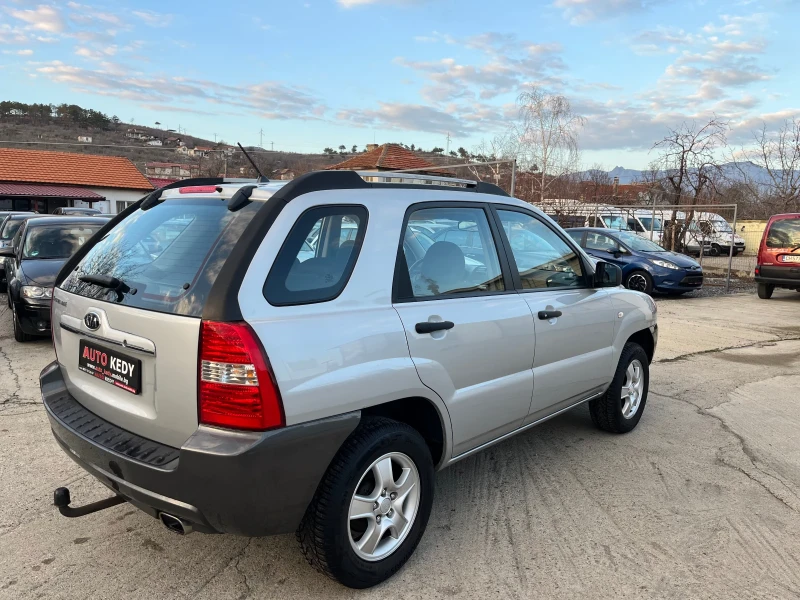 Kia Sportage 2.0i, снимка 5 - Автомобили и джипове - 48910657