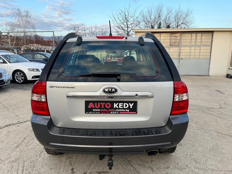 Kia Sportage 2.0i, снимка 6 - Автомобили и джипове - 48910657