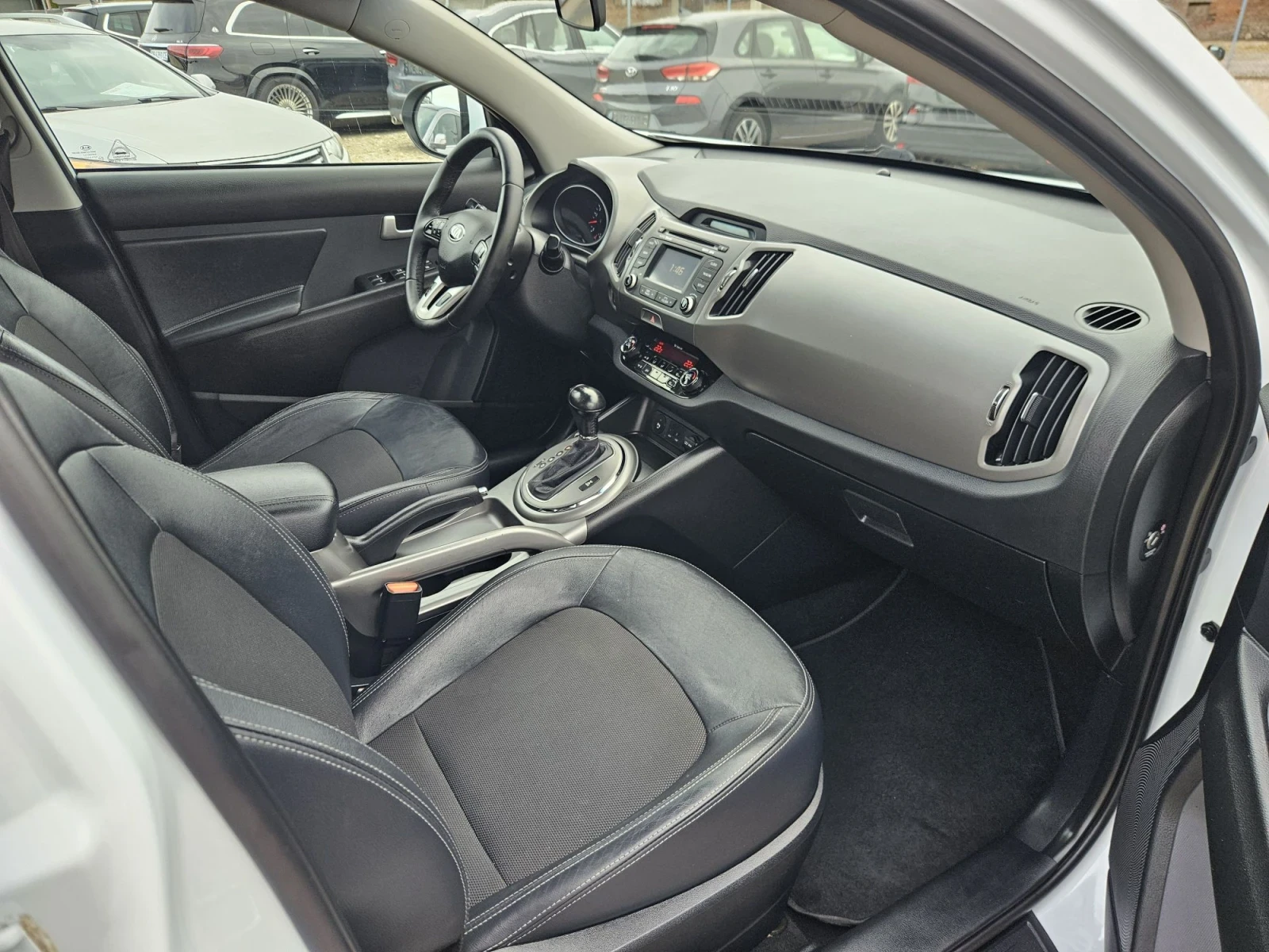 Kia Sportage 2.0-136ks-4x4, снимка 11 - Автомобили и джипове - 56243137