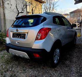     Opel Mokka 1.6-115.. ( )