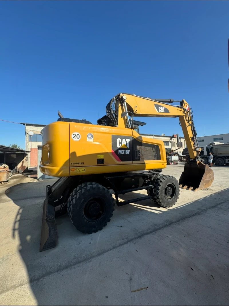 Багер Cat M318F