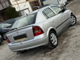 Opel Astra 1.6i 101кс КЛИМАТИК 117хил.км , снимка 6
