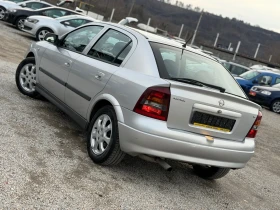 Opel Astra 1.6i 101кс КЛИМАТИК 117хил.км , снимка 4