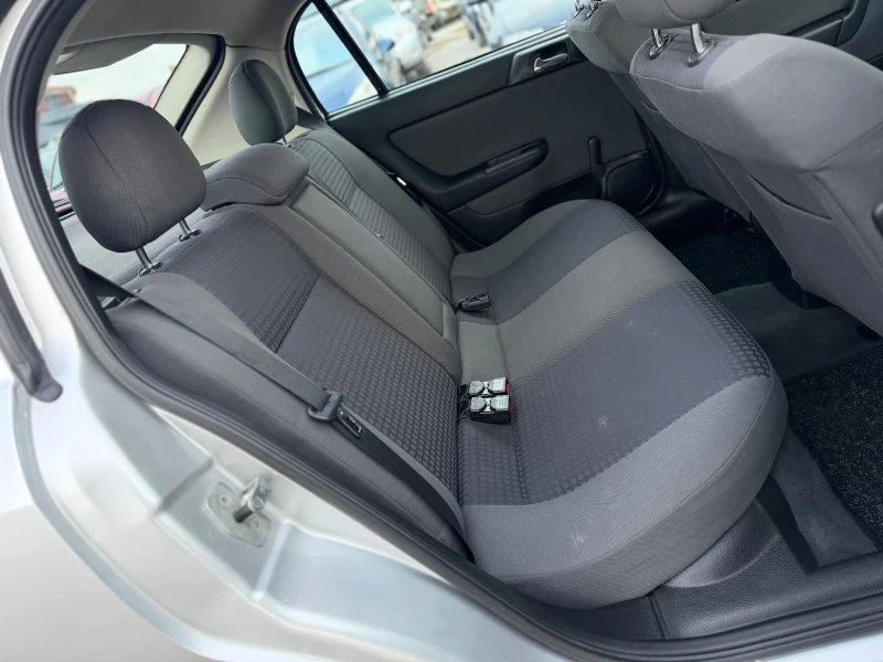 Opel Astra 1.6i 101кс КЛИМАТИК 117хил.км , снимка 13 - Автомобили и джипове - 53271963