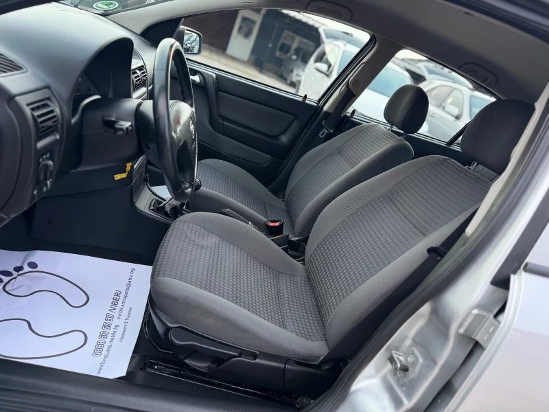 Opel Astra 1.6i 101кс КЛИМАТИК 117хил.км , снимка 11 - Автомобили и джипове - 53271963