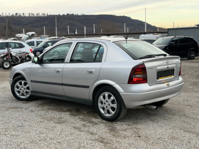 Opel Astra 1.6i 101кс КЛИМАТИК 117хил.км , снимка 8 - Автомобили и джипове - 53271963