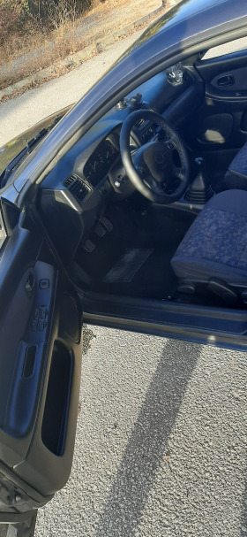 Обява за продажба на Mazda 323 F 1.5V16 DOHC  ~2 499 лв. - изображение 10