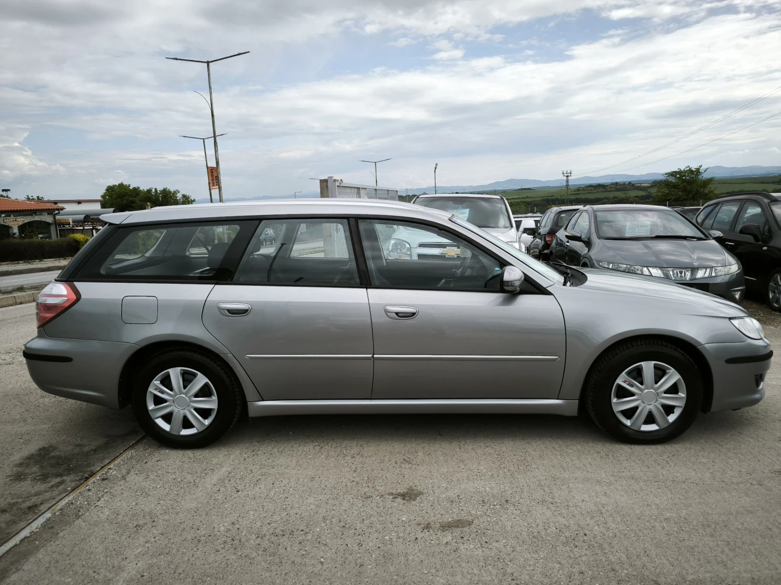 Subaru Legacy 2.0i, снимка 4 - Автомобили и джипове - 54633353