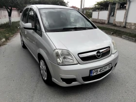 Opel Meriva 1.4i.90k + КЛИМА + ГАЗОВ ИНЖЕКЦИОН 2006г , снимка 10
