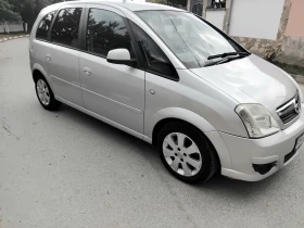 Opel Meriva 1.4i.90k + КЛИМА + ГАЗОВ ИНЖЕКЦИОН 2006г , снимка 11