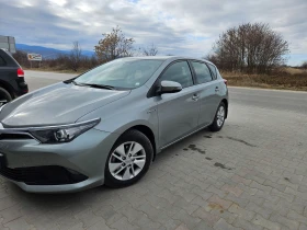 Toyota Auris 1.8 CVT HSD Terra, снимка 2