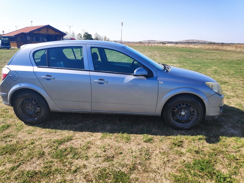 Opel Astra, снимка 11 - Автомобили и джипове - 47422935