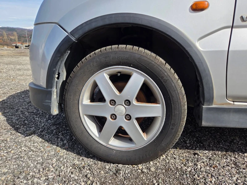 Suzuki Ignis 1.5, снимка 7 - Автомобили и джипове - 53560260